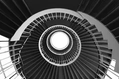 Reve v1.0 — A spiral staircase viewed from directly above, geo