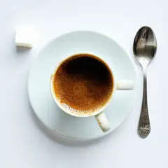 SD 3.5 Large — A cup of coffee on a saucer, with a spoon to the r