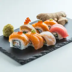 SD 3.5 Large — A perfectly plated sushi omakase on a black slate 