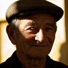 Seedream v4.5 — An elderly man with a weathered face and kind smil