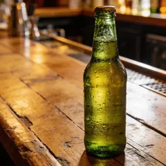 Seedream v4.5 — A green glass bottle of craft beer with condensati