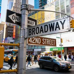 Seedream v4.5 — A street sign at the intersection of BROADWAY and 