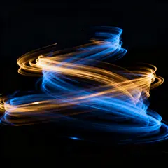 Seedream v4 — Intertwining ribbons of light in blue and gold aga