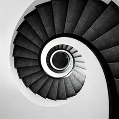 Seedream v4 — A spiral staircase viewed from directly above, geo