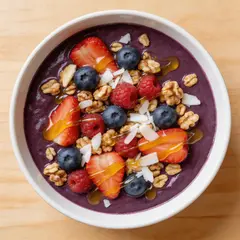 Seedream v5 Lite — A colorful acai bowl topped with fresh berries, gr