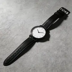 Seedream v5 Lite — A minimalist wristwatch with a black leather strap