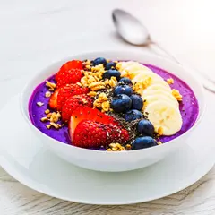 Wan 2.6 T2I — A colorful acai bowl topped with fresh berries, gr