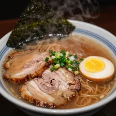 Z-Image Turbo — A steaming bowl of ramen with chashu pork, soft-bo