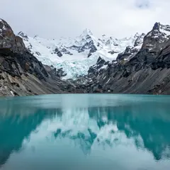 Z-Image Turbo — A turquoise glacial lake surrounded by snow-capped