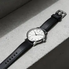 Z-Image Turbo — A minimalist wristwatch with a black leather strap