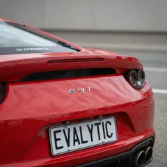 Z-Image Turbo — A license plate reading EVALYTIC on the back of a 